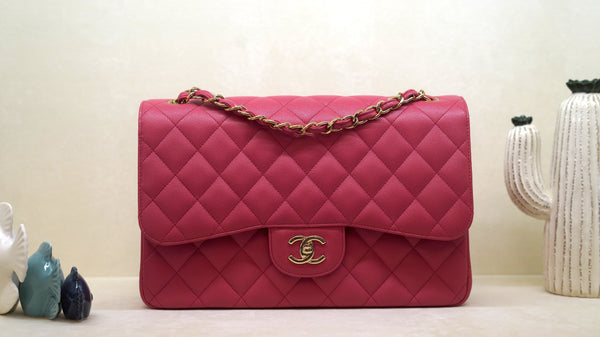 Chanel Classic Jumbo en caviar rosa – herrajes dorados